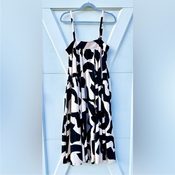 Abel The Label Dresses & Skirts - Gorgeous Anthro ATL ruffled, tiered,  swing dress. Flowy & has POCKETS 😍